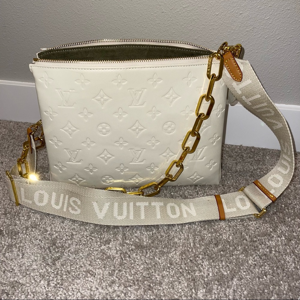 Cream embossed handbag